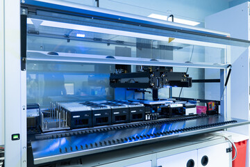 Lab Technologist Uses Flow Cytometry Equipment for Research