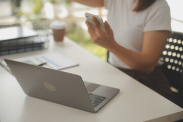 Young adult happy smiling Hispanic Asian student wearing headphones talking on online chat meeting...