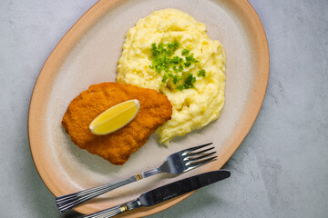Typical Czech cuisine chicken cutlet with mashed potatoes