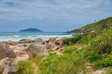Fototapeta na wymiar Scenic coastline with ocean and waves in Brazil.