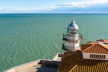 Lighthouse overlooking the sea - 731908483