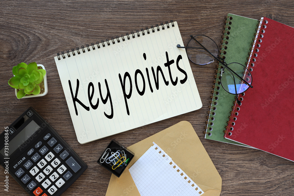 Poster on the work desk there is a red notepad, an envelope, a calculator. text key points