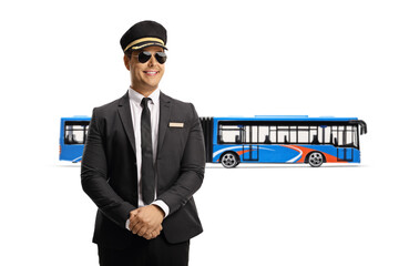 Chauffeur in a uniform in front of a city bus