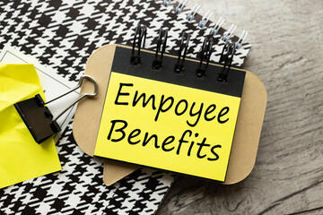 EMPLOYEE BENEFITS bright stickers. text on note paper
