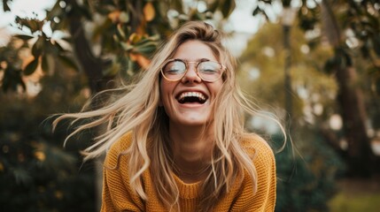 Woman With Glasses Laughing in a Park