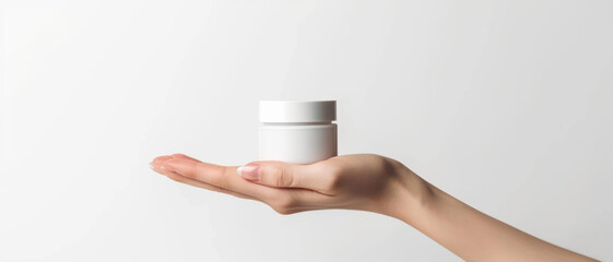 Minimalist beauty, a hand presenting skincare purity in a simple gesture