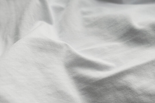 White Linen Material Background. Light Fabric Textile Pattern. Empty Bed Surface.