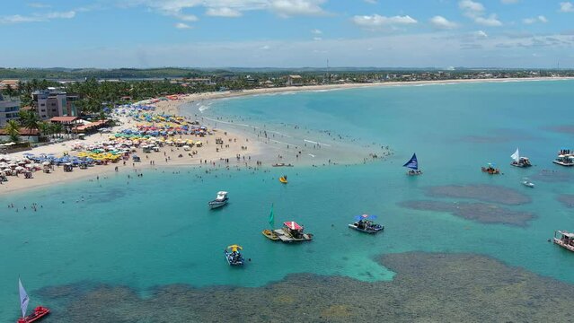 Porto de Galinhas (Port of Chickens). Beach. During low tide, the coral reefs in Porto Galinhas are home to stunning tidal pools full of tropical fish. Brazil.