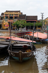 Fototapeta na wymiar Fishing Boats on the shores of Hoi An, Vietnam