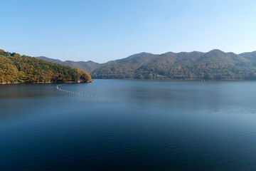 View of the lake in the autumn mountains