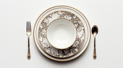 Individual crockery and cutlery set on a white table..