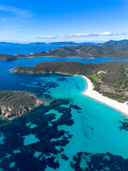 Tuerredda beach seen from above with a drone, surrounded by its famous turquoise sea, on the south-west coast of Sardinia. Coast of Tuerredda bay, Teulada, Sardinia, Italy.