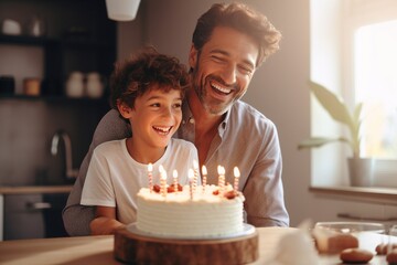 Father and son is celebrating birthday with cake