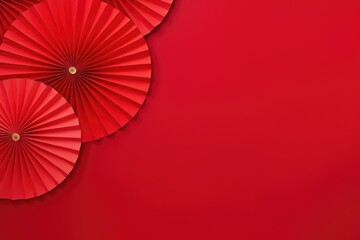 Chinese new year festival decoration, red paper fans flat lay top view