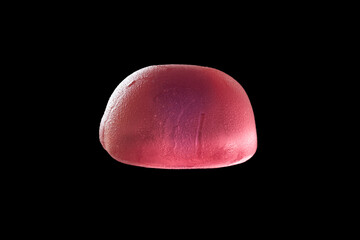 Jelly candies. Jelly cherry candy on a black background