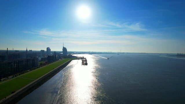 Bremerhaven - Northern Germany - Aerial aerial view along the dike to the skyline