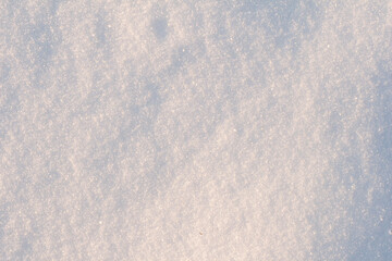 Snow surface close-up in sunny weather.