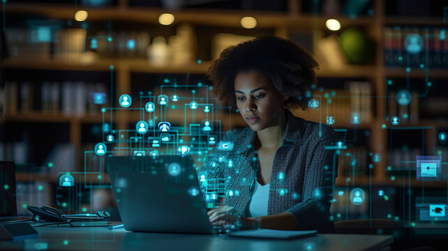 A beautiful short-haired project manager working on a computer in the office Augmented Reality social media icons appear on employees' laptops ,generative ai