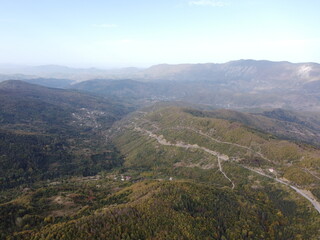 Aerial autumn  view jungle and road 