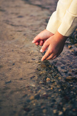 Children's hands in the water