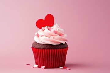 Delicious cupcake with heart for Valentine Day close-up with copy space