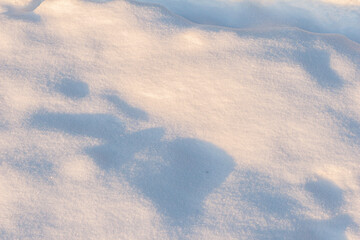 Uneven snow surface close-up.