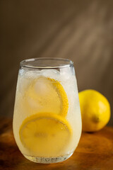 Glass of refreshing lemon homemade drink.
