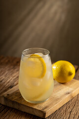 Glass of refreshing lemon homemade drink.