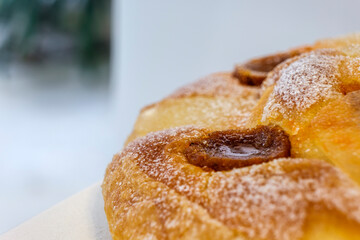 Ensaimada dels Darrers Dies, decorated with sobrassada and pumpkin, typical of the last days before beginning the period of Lent, Mallorca, Spain
