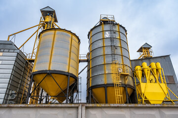 silos and agro-processing plant for processing for drying cleaning and storage and seed preparation complex in snow of winter field