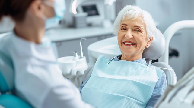 Selective focus of smiling senior woman in dental chair and dentist looking at camera. AI.