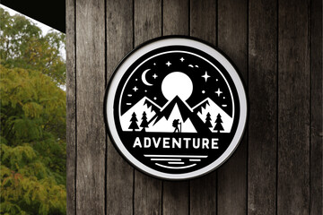 Black Mountain Hiking Night Vibes in Circle White Signboard on the empty Wood Wall