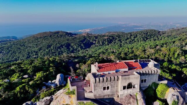Drone circling Peninha Sanctuary on the top of the cliff at Sintra Cascais Natural Park, Portugal