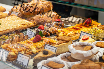 Variety of desserts on central market  in Valencia, Spain