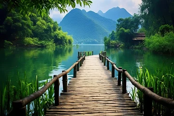 Keuken foto achterwand Karelsbrug A bamboo bridge leading into the lake side of the hill