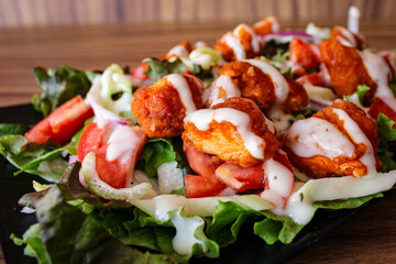 Delicious boneless BBQ salad with ranch dressing.