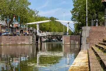 Fototapeten Utrecht, the Netherlands. 12 June 2023. Drawbridge at the Oude Sluis in Vreeswijk. Vreeswijk is a former village and municipality in the Dutch province of Utrecht.  © PixelBiss