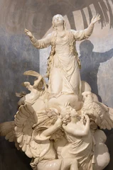 Schilderijen op glas GENOVA, ITALY - MARCH 8, 2023: The marble statue of St. Agnese in the church Chiesa di Nostra Signora del Carmine e Sant Agnese by Nicolo Stefano Traverso (1790). © Renáta Sedmáková