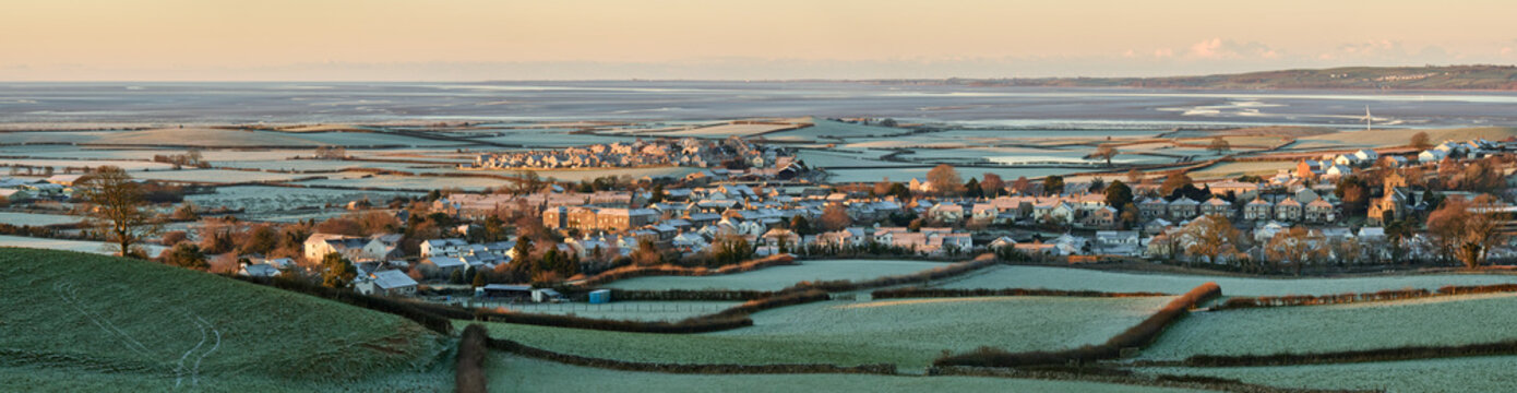 Panorama of Flookburgh, Cark and Ravenstown, with Morecambe Bay in the distance, on a frosty winters morning.