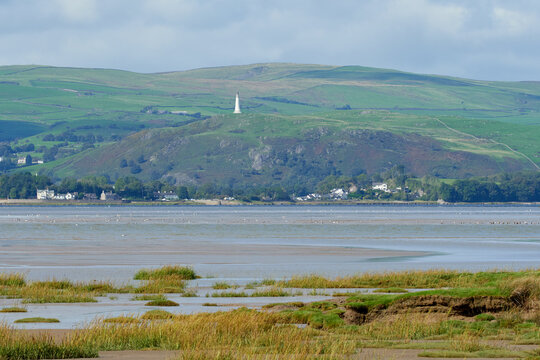 Hoad Hill and Canal Foot in Ulverston viewed across Morecambe Bay from Sandgate near Flookburgh.