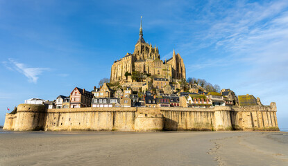 Mont Saint Michel at low tide and sunshine, no crowd - obrazy, fototapety, plakaty