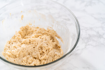 Lemon poppy seed muffins garnished with almond slivers