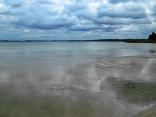Overcast Sky Over Peaceful Lake