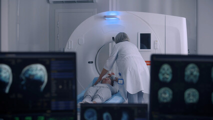 Female doctor conducts emergency check up procedure with advanced medical technologies....