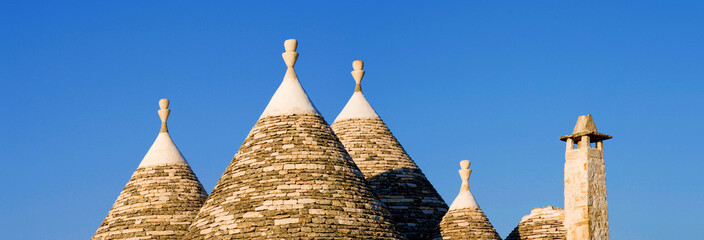 Fototapeta na wymiar Roofs of a trullo house, Apulia, Italy
