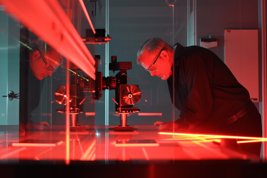 Focused Expertise: Senior Scientist Aligning Laser in High-Tech Lab. Generative AI.v