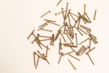 screws,catered screws on a white background, bolts, screws for mounting in wooden walls isolated on a white background