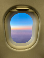 Sunset through an airplane window