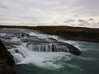 The Ægissíðufoss waterfall in Ytri-Rangá is a few kilometers further down the river from Hella