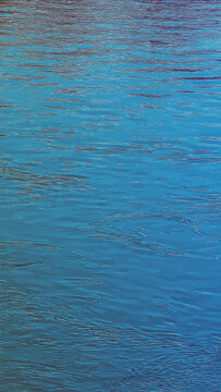 Illustration of the water surface texture of the Salzach river. Vectical 9 by 16